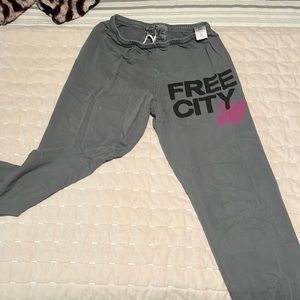 Gray freecity sweatpants with pink detailing